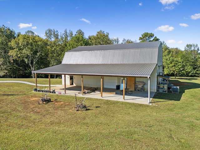 exterior space with a lawn and a patio area