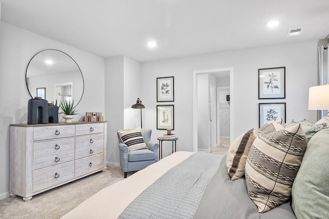 bedroom with recessed lighting, light colored carpet, visible vents, and baseboards