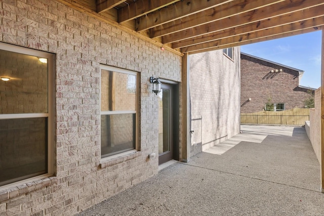 view of patio / terrace with fence