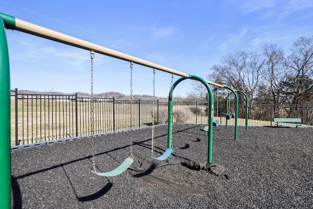 community playground featuring fence