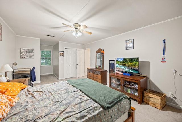 bedroom featuring light carpet, baseboards, visible vents, and crown molding