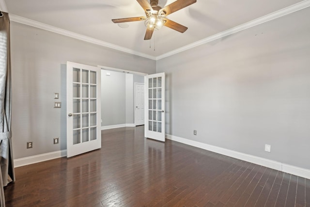 spare room featuring french doors, ornamental molding, ceiling fan, wood finished floors, and baseboards