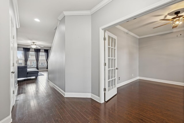 corridor featuring wood-type flooring, baseboards, crown molding, and recessed lighting