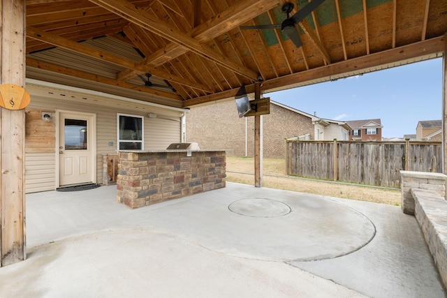 view of patio / terrace featuring a ceiling fan, a grill, fence, and area for grilling