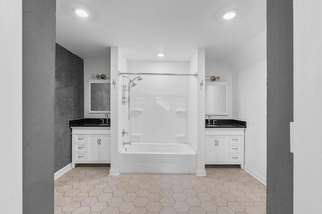 full bath featuring recessed lighting, washtub / shower combination, and vanity