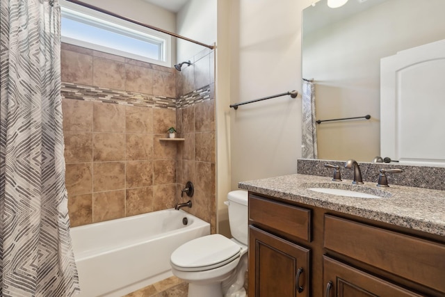 bathroom featuring shower / bath combo, vanity, and toilet