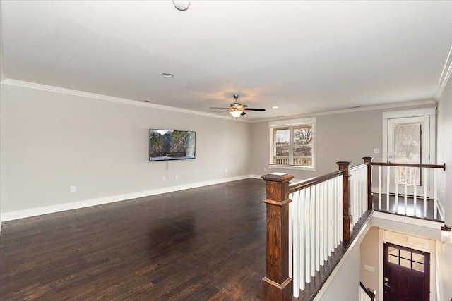 unfurnished room with ceiling fan, recessed lighting, wood finished floors, baseboards, and crown molding