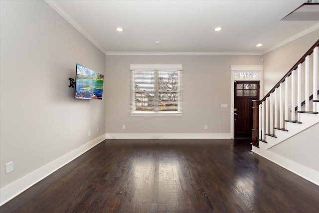 entryway featuring ornamental molding, recessed lighting, wood finished floors, and baseboards