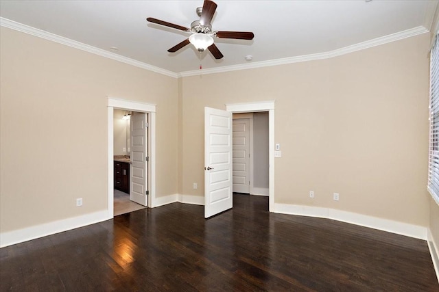 unfurnished bedroom with ornamental molding, baseboards, and wood finished floors