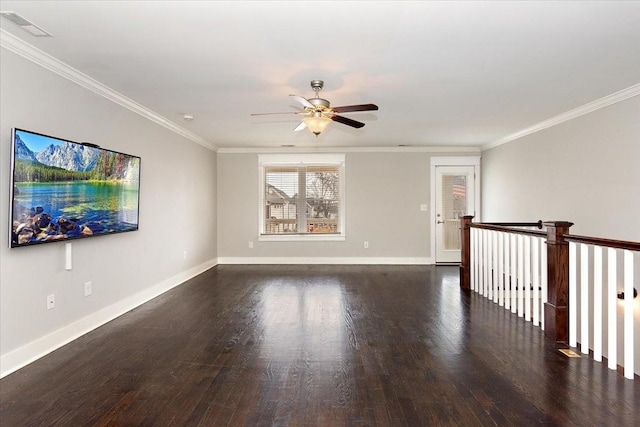 unfurnished room featuring visible vents, baseboards, and wood finished floors