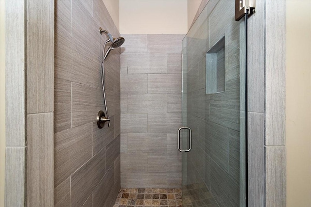 bathroom featuring a stall shower