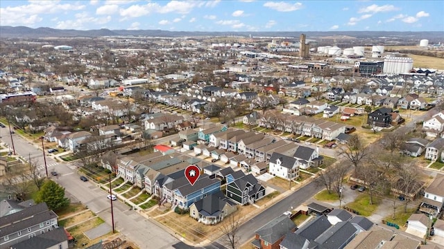 birds eye view of property with a residential view