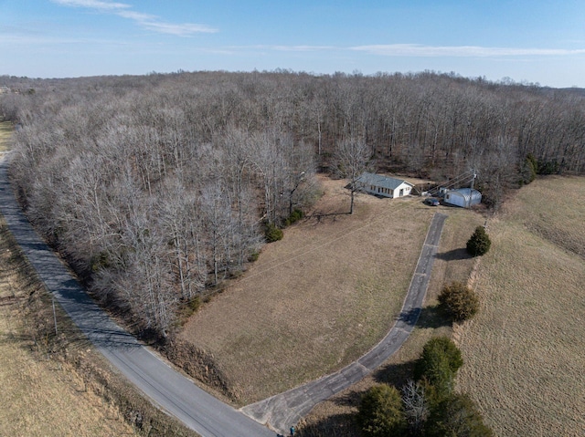 drone / aerial view with a rural view and a view of trees