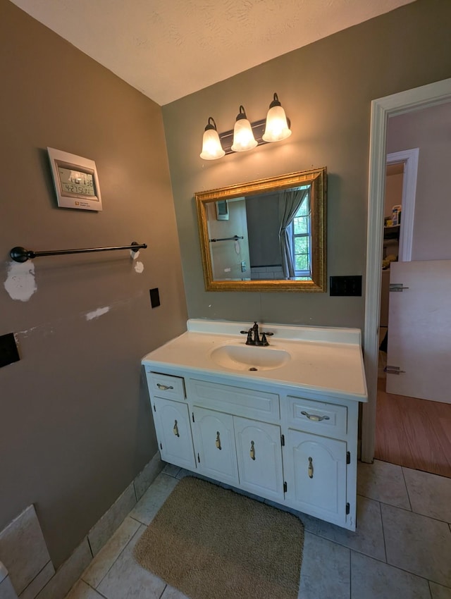 4460 Bold Springs Rd, Mc Ewen, TN 37101 - bathroom featuring vanity, tile patterned flooring, and baseboards