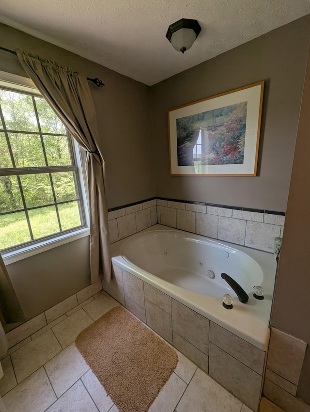 4460 Bold Springs Rd, Mc Ewen, TN 37101 - full bathroom featuring a jetted tub, tile patterned floors, and a textured ceiling