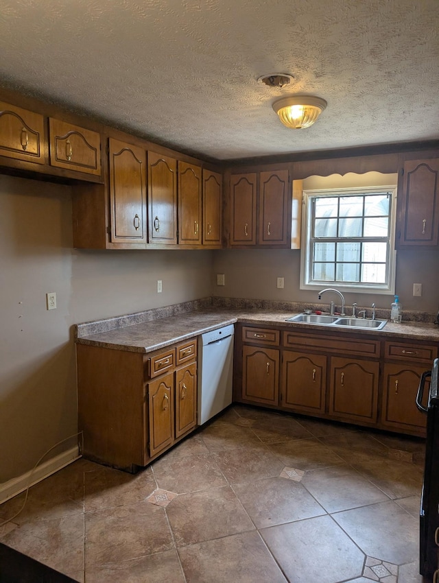 4460 Bold Springs Rd, Mc Ewen, TN 37101 - kitchen featuring dishwasher, a sink, a textured ceiling, brown cabinetry, and range