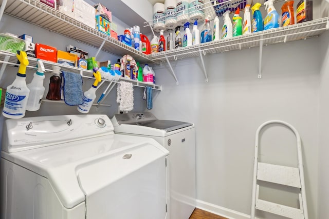 laundry room with laundry area and washer and clothes dryer