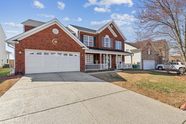 traditional home featuring an attached garage, covered porch, central AC, brick siding, and concrete driveway