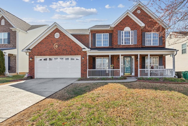 traditional-style house featuring brick siding, a porch, concrete driveway, an attached garage, and a front lawn