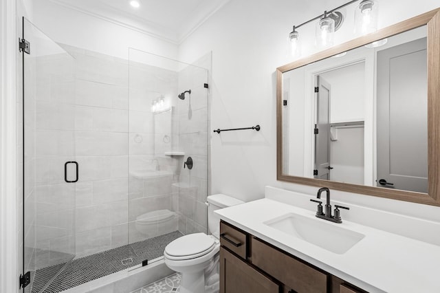 bathroom featuring toilet, a stall shower, crown molding, and vanity