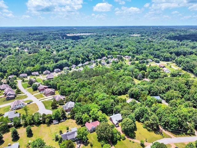 bird's eye view featuring a forest view