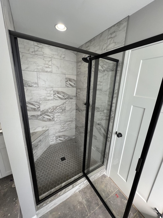 bathroom featuring a shower stall and recessed lighting