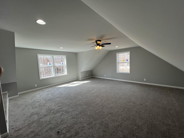 bonus room featuring carpet, baseboards, vaulted ceiling, and recessed lighting