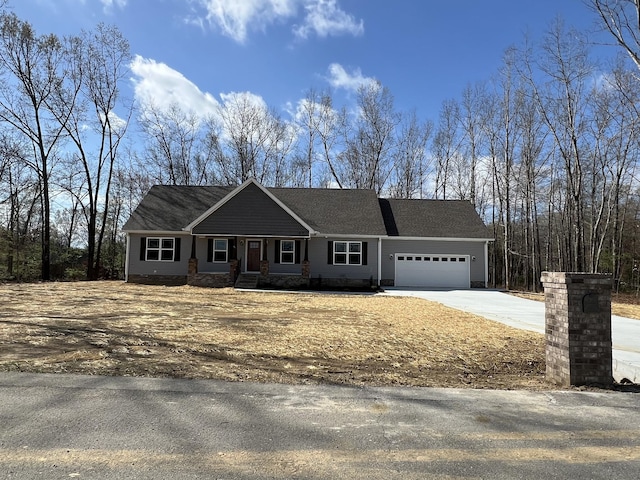 view of front of home featuring driveway and an attached garage