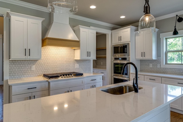 kitchen with ornamental molding, custom exhaust hood, built in microwave, stainless steel gas cooktop, and a sink