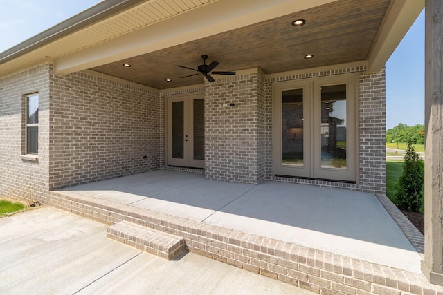 view of patio with french doors and a ceiling fan