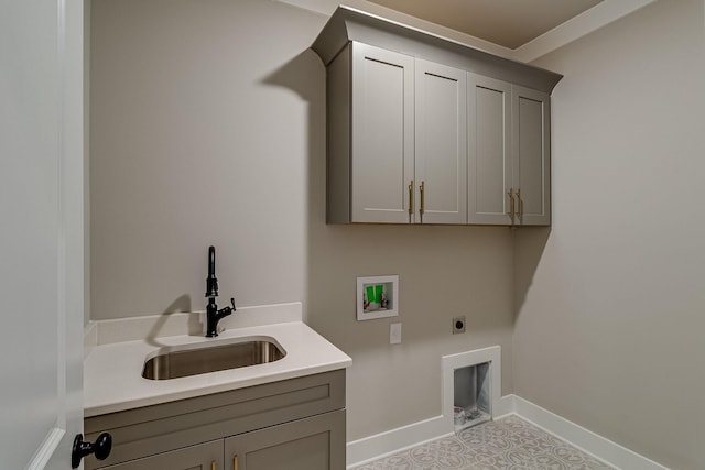 laundry room featuring washer hookup, cabinet space, a sink, electric dryer hookup, and baseboards