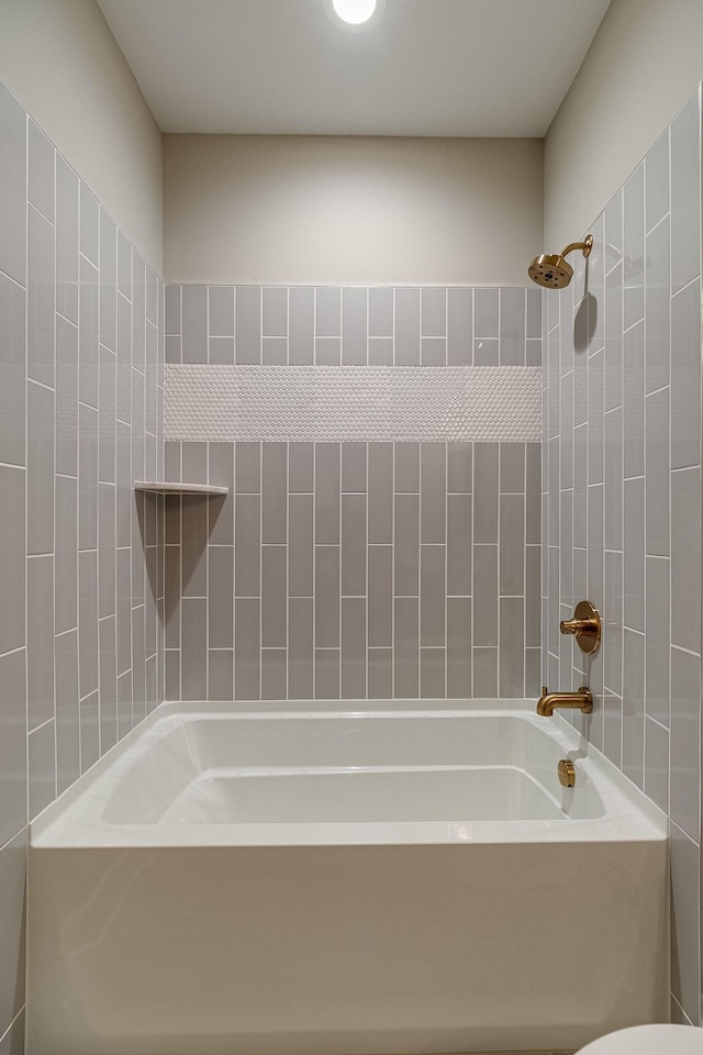 full bath featuring tub / shower combination