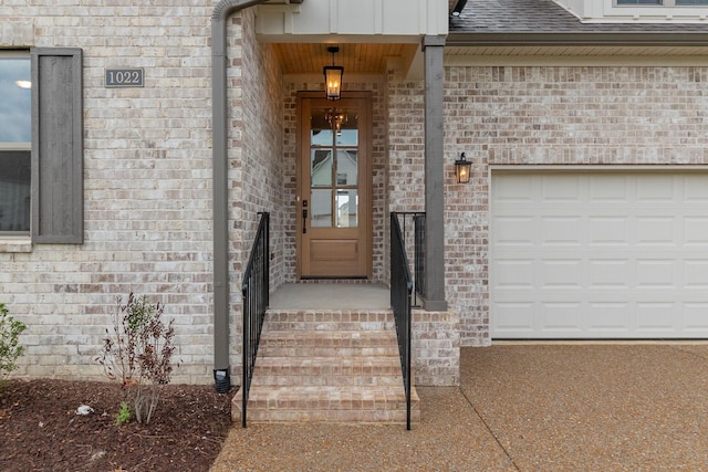 property entrance with a garage, brick siding, and a shingled roof