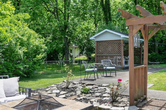 view of patio featuring fence