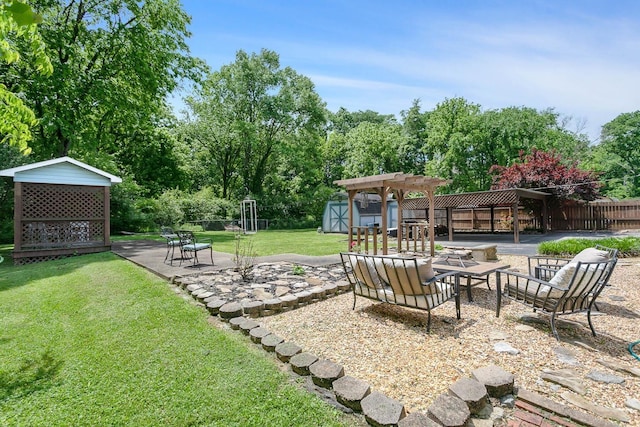 view of yard with a patio area, fence, and a pergola