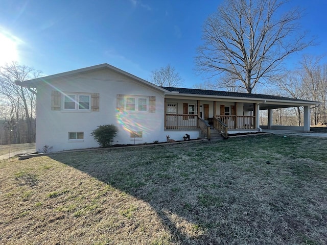 single story home featuring a carport, a front lawn, and a porch