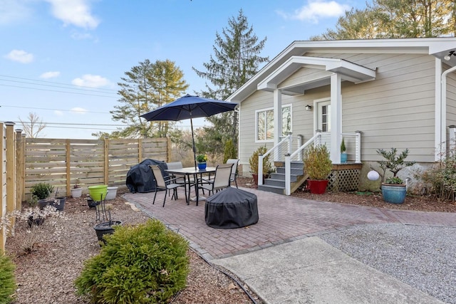 view of patio / terrace featuring fence and area for grilling