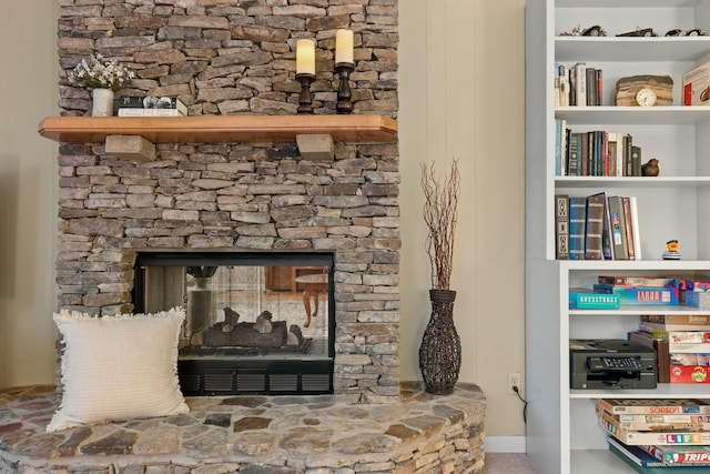 room details with a stone fireplace