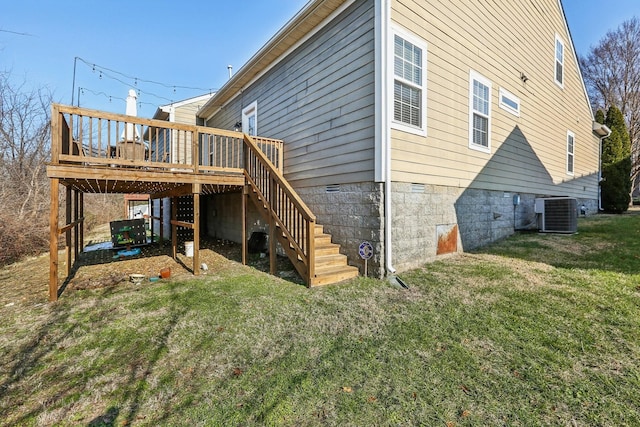 rear view of house featuring stairs, a deck, a lawn, and cooling unit