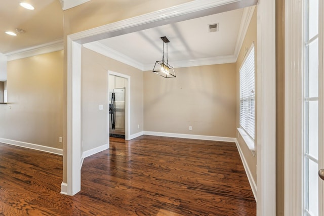 unfurnished dining area featuring baseboards, dark wood-type flooring, and crown molding