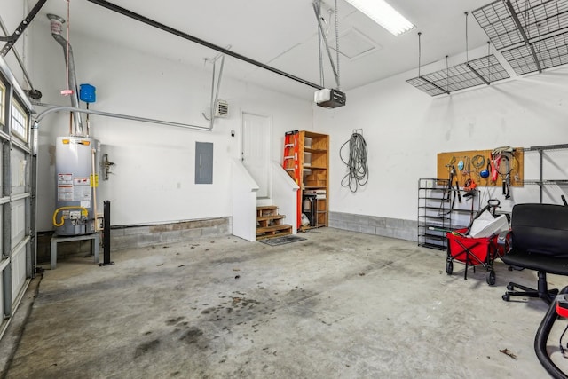 garage featuring electric panel, water heater, and a garage door opener