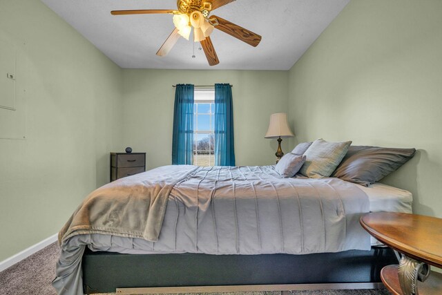 bedroom featuring carpet flooring, ceiling fan, and baseboards