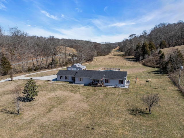 drone / aerial view with a forest view