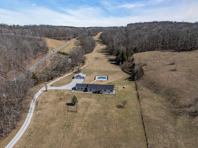 aerial view with a view of trees and a rural view