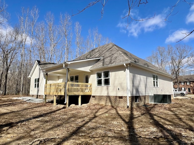 view of home's exterior with a shingled roof, crawl space, and central air condition unit