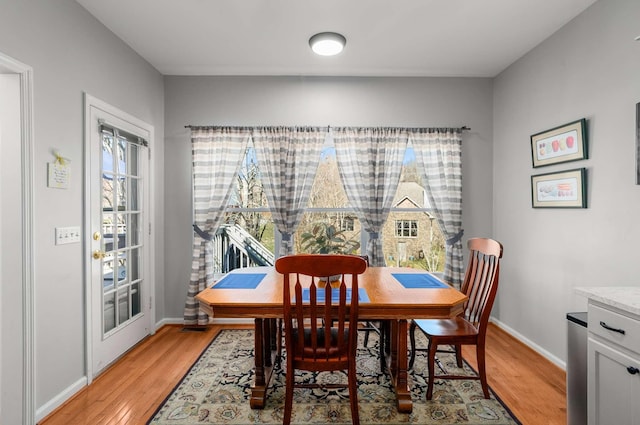 6545 Chessington Dr, Nashville, TN 37221 - dining space with light wood finished floors and baseboards