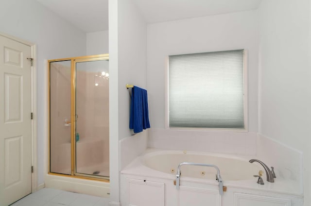 6545 Chessington Dr, Nashville, TN 37221 - bathroom with a jetted tub and a shower stall