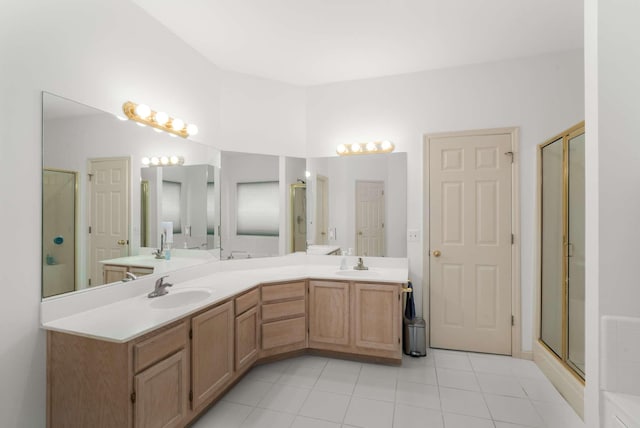 6545 Chessington Dr, Nashville, TN 37221 - bathroom featuring tile patterned flooring, a sink, a shower stall, and double vanity