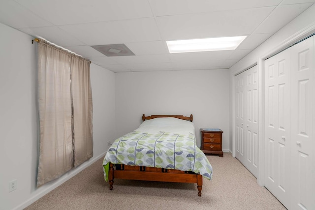 6545 Chessington Dr, Nashville, TN 37221 - carpeted bedroom featuring a paneled ceiling and two closets