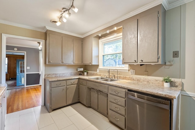 kitchen featuring gray cabinetry, a sink, light countertops, ornamental molding, and dishwasher